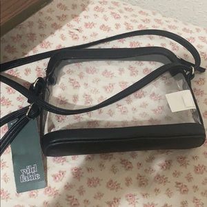 Clear bag with black leather trim! Brand new.